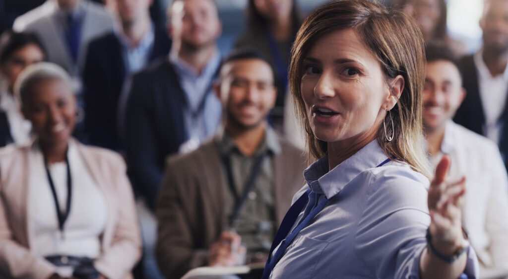 Sales professionals attending a leadership training seminar